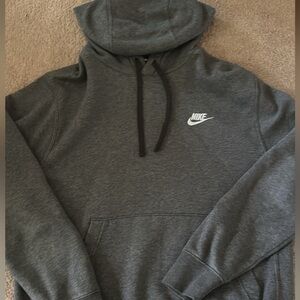 small grey nike sweatshirt.